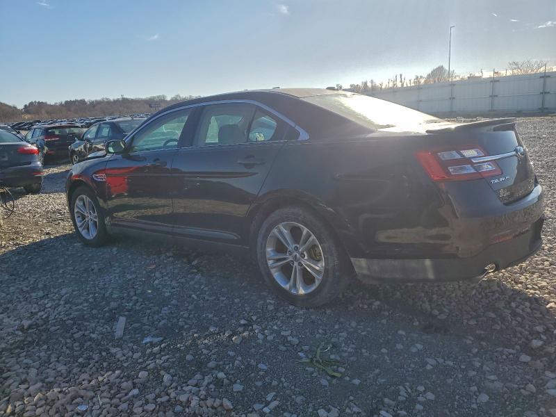 Photo 2 from auction – 2013 FORD TAURUS SEL with VIN 1FAHP2E83DG180859