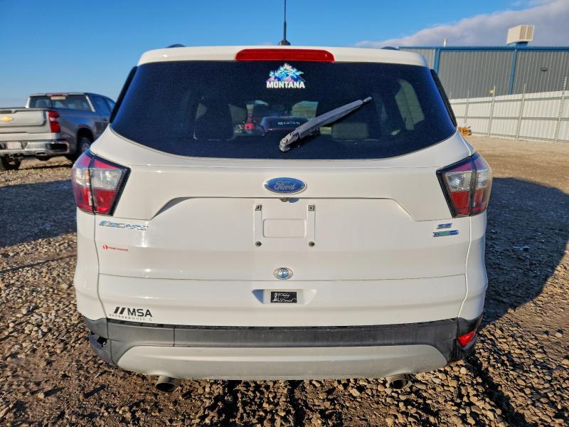 Photo 6 from auction – 2018 FORD ESCAPE SE with VIN 1FMCU9GD3JUB17575