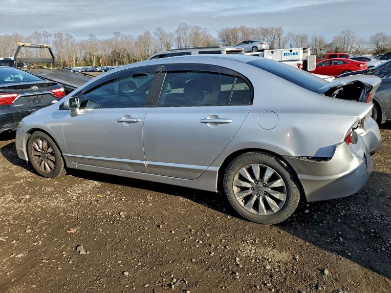 Photo 2 from auction – 2010 HONDA CIVIC with VIN 19XFA1F9XAE038802