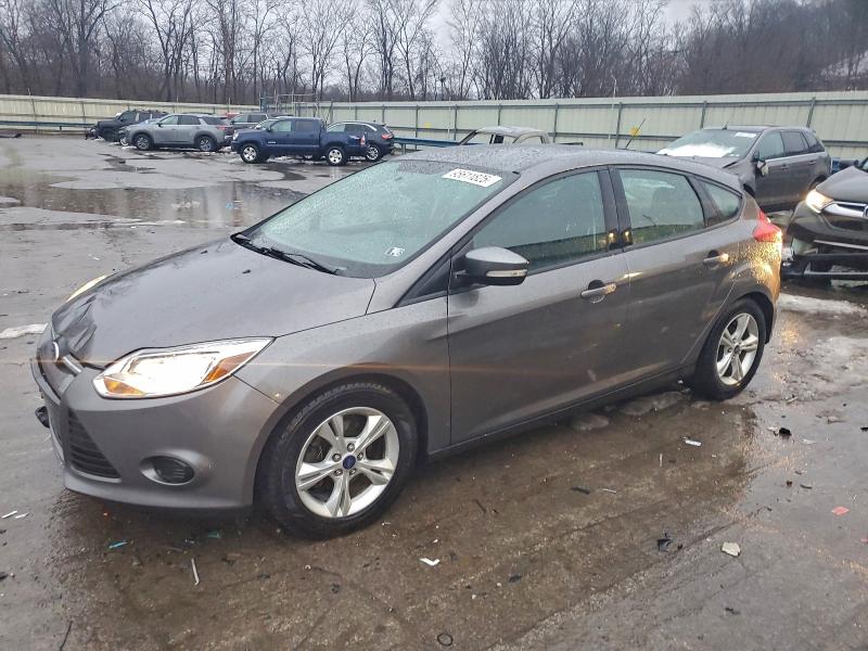 FORD FOCUS SE 2013 with VIN 1FADP3K21DL324128 - Photo from auction