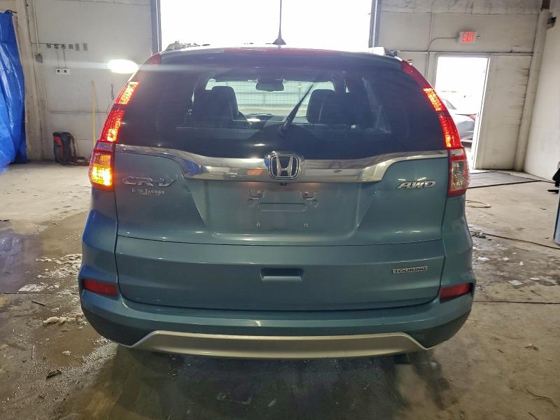 Photo 6 from auction – 2016 HONDA CR-V TOURI with VIN 5J6RM4H94GL061733