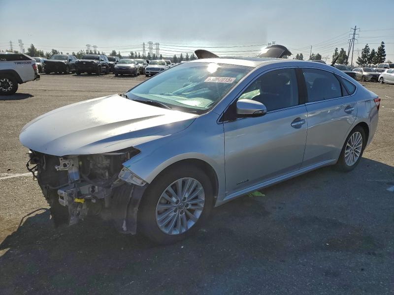 TOYOTA AVALON HYB 2014 with VIN 4T1BD1EBXEU023746 - Photo from auction