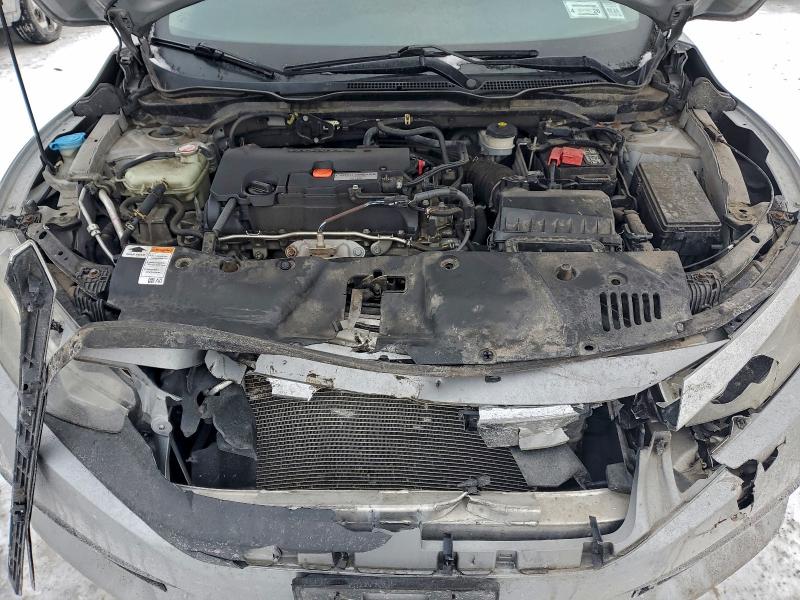 Photo 11 from auction – 2018 HONDA CIVIC LX with VIN 2HGFC2F50JH528510