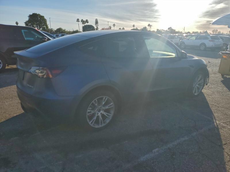 Photo 3 from auction – 2023 TESLA MODEL Y with VIN 7SAYGDEE1PF895636