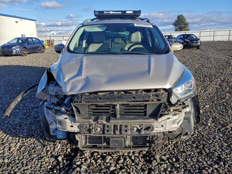 Photo 5 from auction – 2017 FORD ESCAPE with VIN 1FMCU9J95HUC14159