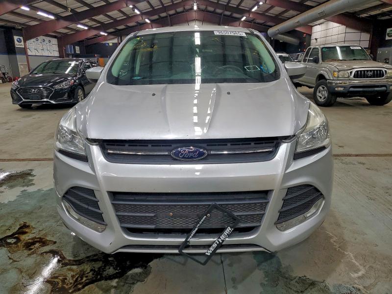 Photo 5 from auction – 2015 FORD ESCAPE with VIN 1FMCU9G94FUA18458