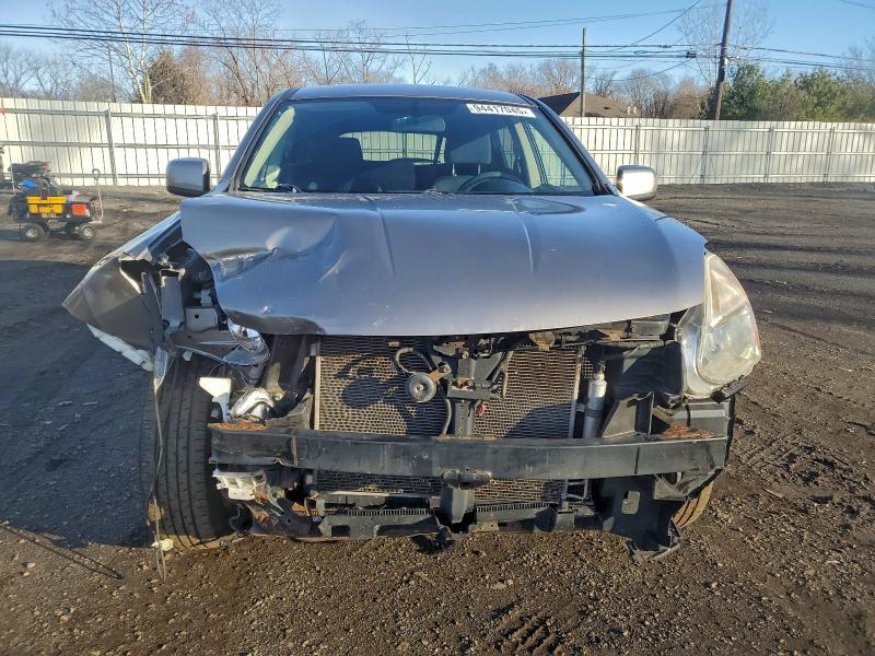Photo 5 from auction – 2013 NISSAN ROGUE S with VIN JN8AS5MV2DW641353