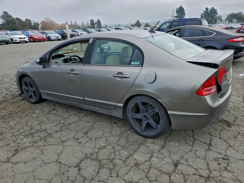 Photo 2 from auction – 2007 HONDA CIVIC HYBR with VIN JHMFA36297S005387