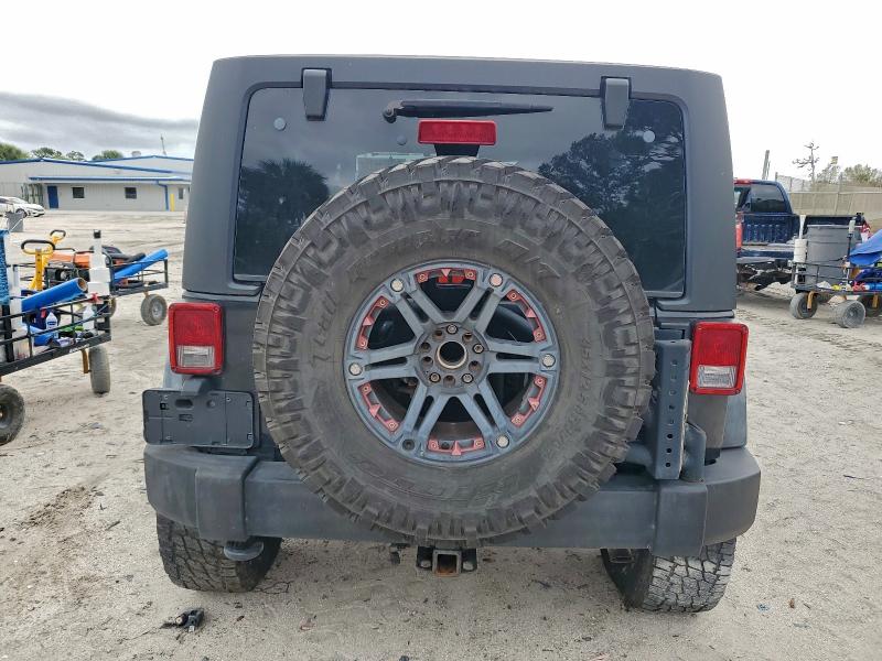 Photo 6 from auction – 2012 JEEP WRANGLER U with VIN 1C4BJWDG9CL142575