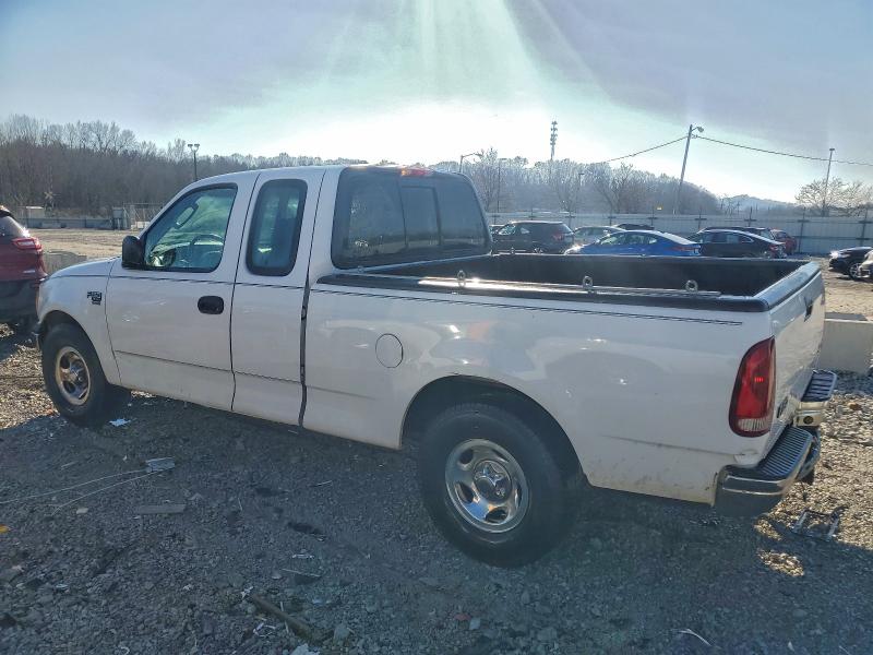 Photo 2 from auction – 1999 FORD F150 with VIN 1FTRX18W5XNA27936