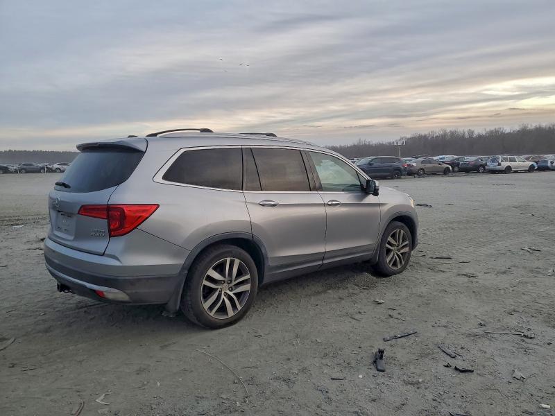 Photo 3 from auction – 2016 HONDA PILOT TOUR with VIN 5FNYF6H95GB058964