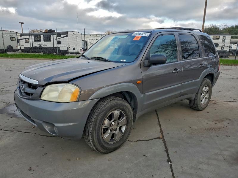 MAZDA TRIBUTE LX 2002 with VIN 4F2YU08122KM57145 - Photo from auction