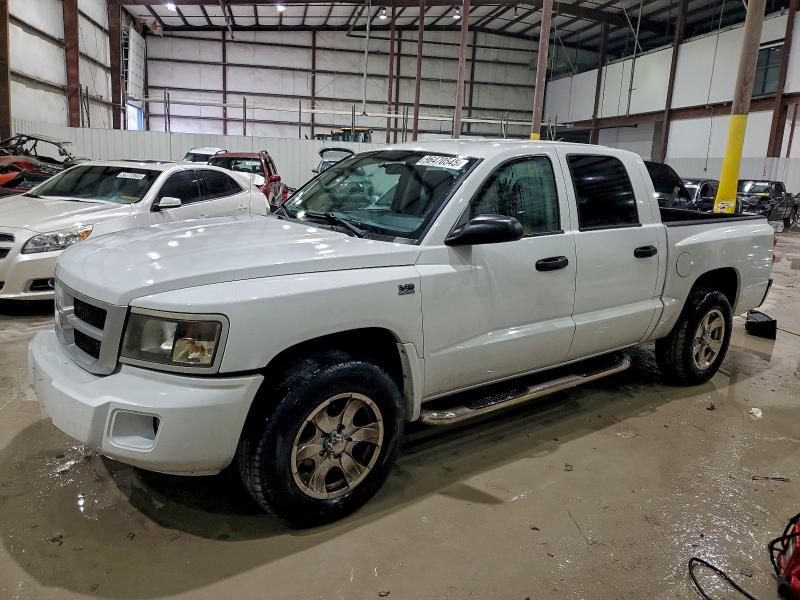 DODGE DAKOTA SLT 2011 with VIN 1D7RE3GP8BS614014 - Photo from auction