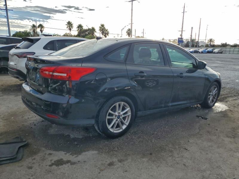 Photo 3 from auction – 2018 FORD FOCUS SE with VIN 1FADP3F25JL245678