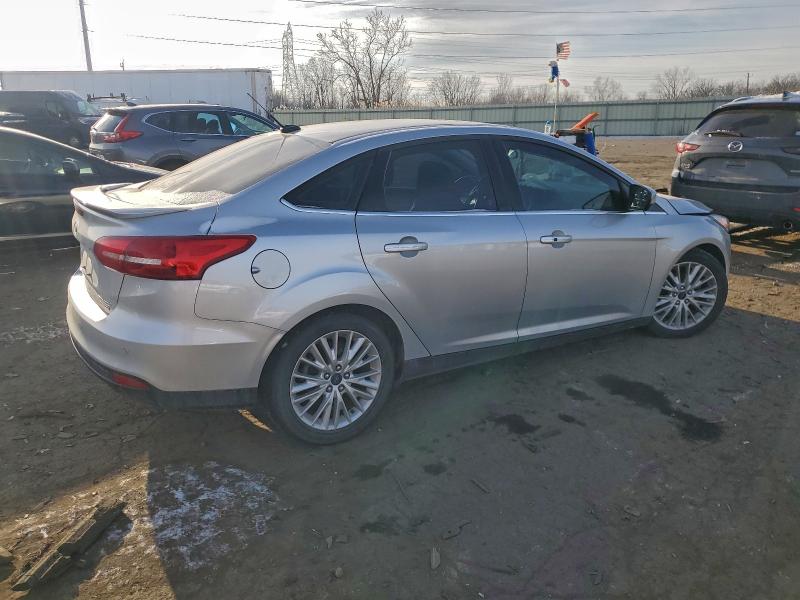 Photo 3 from auction – 2015 FORD FOCUS TITA with VIN 1FADP3J26FL355458