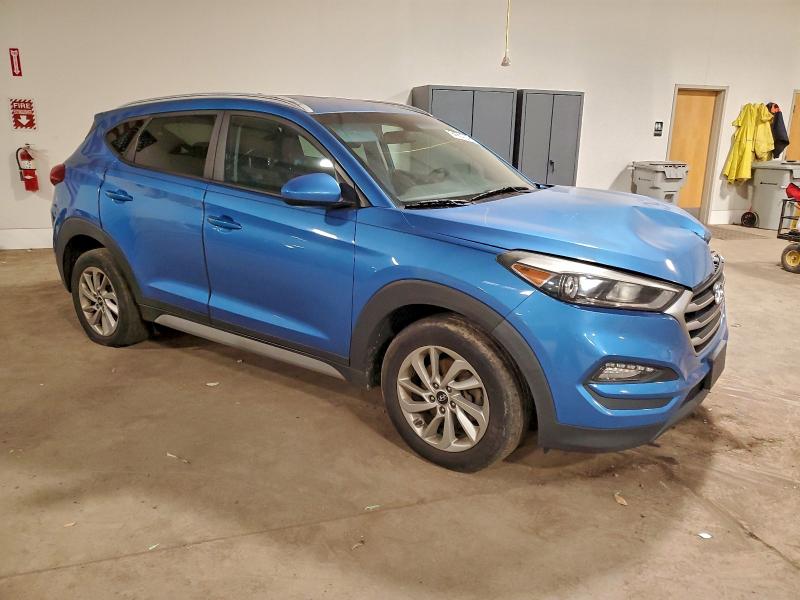 Photo 4 from auction – 2018 HYUNDAI TUCSON SEL with VIN KM8J3CA4XJU699447