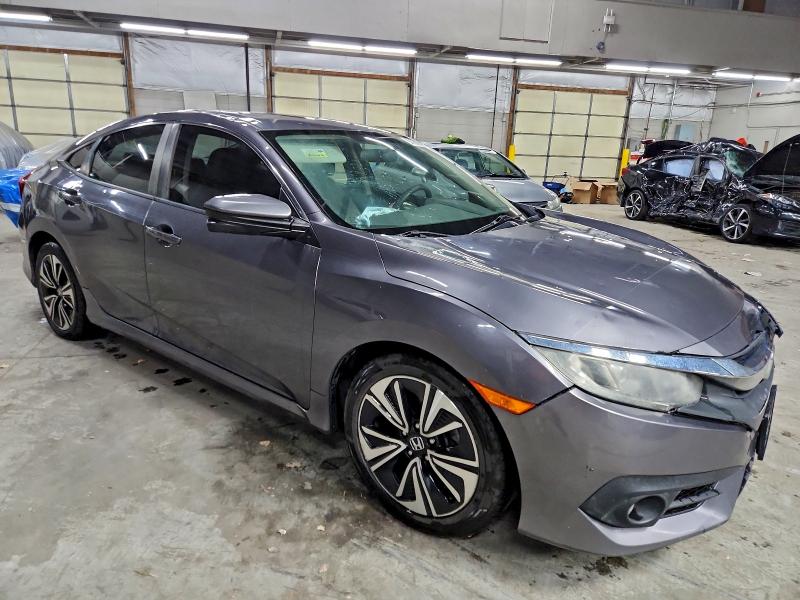 Photo 4 from auction – 2016 HONDA CIVIC with VIN 19XFC1F35GE028631