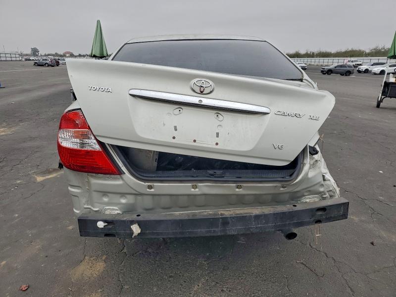 Photo 6 from auction – 2002 TOYOTA CAMRY LE with VIN JTDBF30K020052550