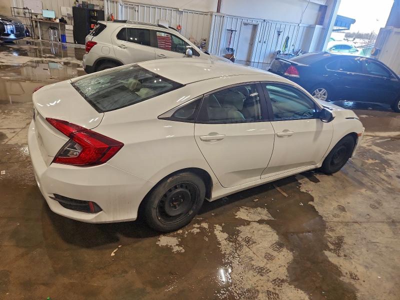 Photo 3 from auction – 2018 HONDA CIVIC LX with VIN 2HGFC2F50JH568473