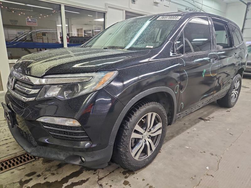 HONDA PILOT EXL 2018 with VIN 5FNYF6H53JB030620 - Photo from auction