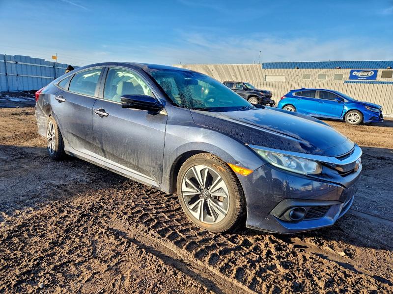 Photo 4 from auction – 2016 HONDA CIVIC EX with VIN 19XFC1F42GE024058