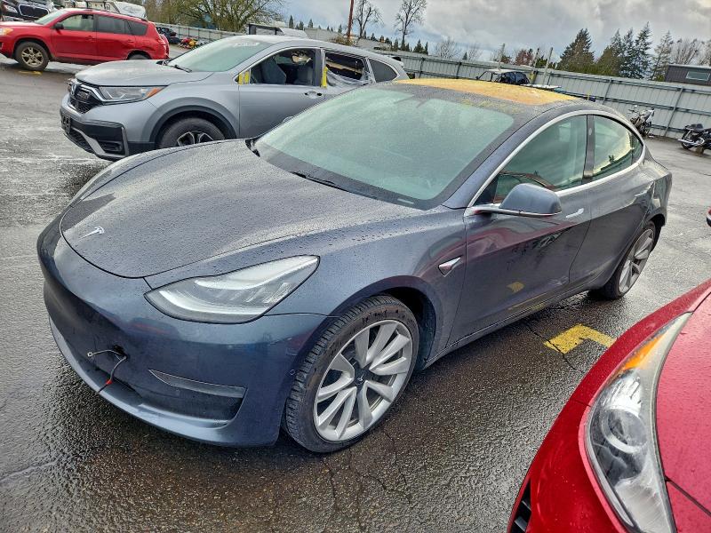 TESLA MODEL 3 2019 with VIN 5YJ3E1EA9KF300873 - Photo from auction