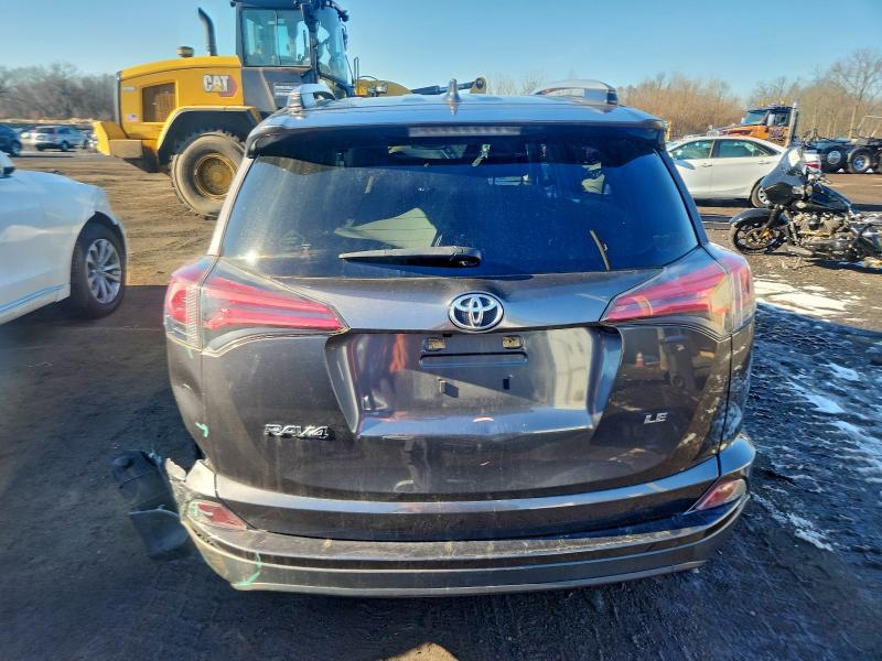 Photo 6 from auction – 2018 TOYOTA RAV4 LE with VIN JTMZFREV8JJ200098
