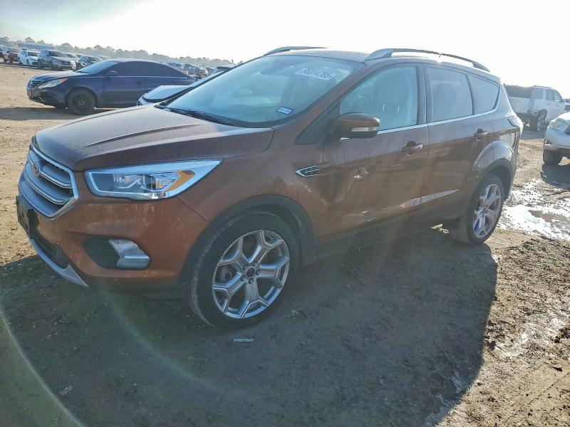 Photo 1 from auction – 2017 FORD ESCAPE TIT with VIN 1FMCU0J92HUE94604