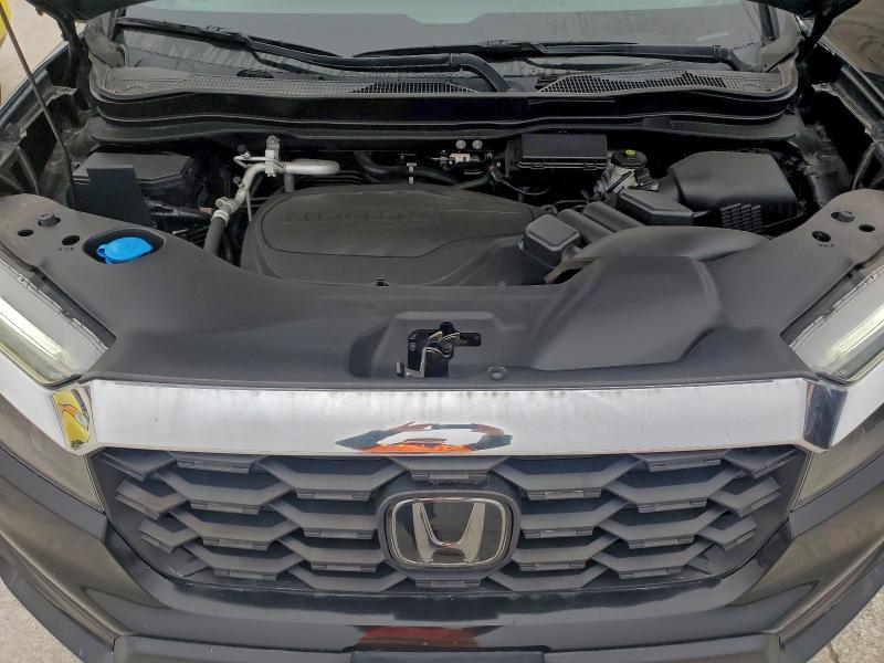 Photo 12 from auction – 2022 HONDA PASSPORT E with VIN 5FNYF8H53NB009333