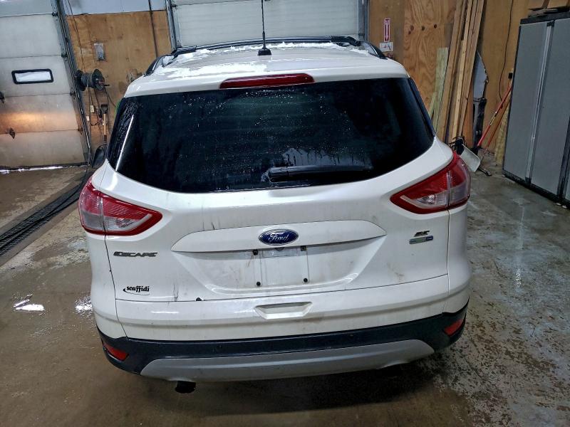 Photo 6 from auction – 2016 FORD ESCAPE SE with VIN 1FMCU9GX6GUC21528