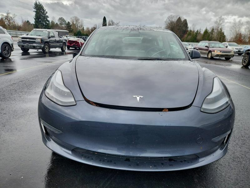 Photo 5 from auction – 2023 TESLA MODEL 3 with VIN 5YJ3E1EA2PF644343