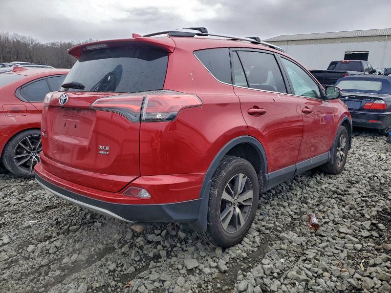Photo 3 from auction – 2016 TOYOTA RAV4 XLE with VIN 2T3RFREV1GW416949