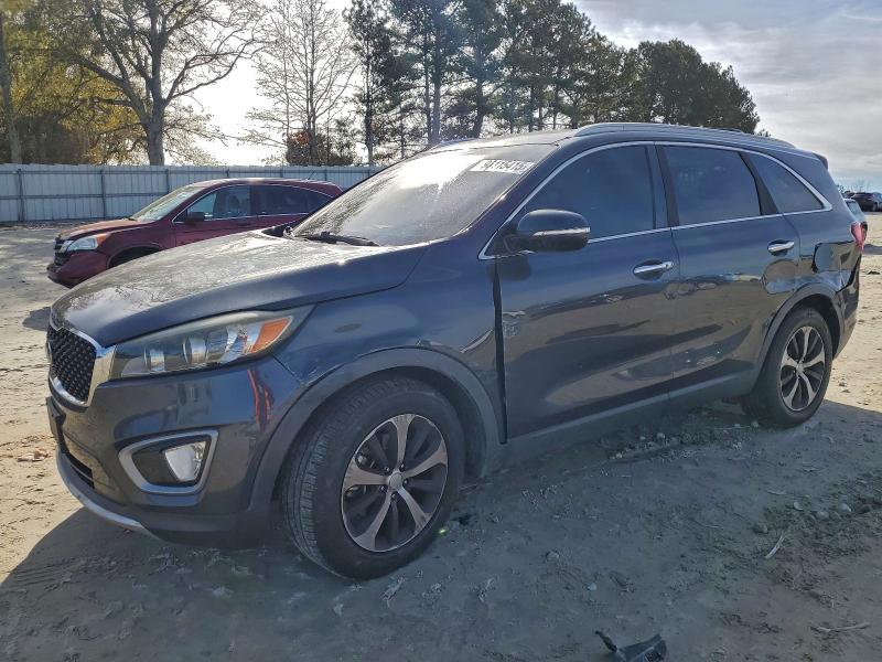 KIA SORENTO EX 2016 with VIN 5XYPH4A18GG126830 - Photo from auction