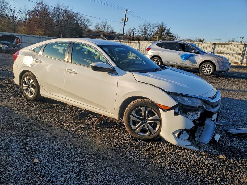 Photo 4 from auction – 2017 HONDA CIVIC LX with VIN 19XFC2F59HE225519