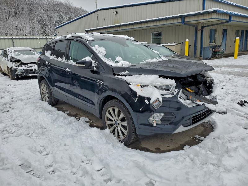 Photo 4 from auction – 2017 FORD ESCAPE with VIN 1FMCU9JD8HUE57033