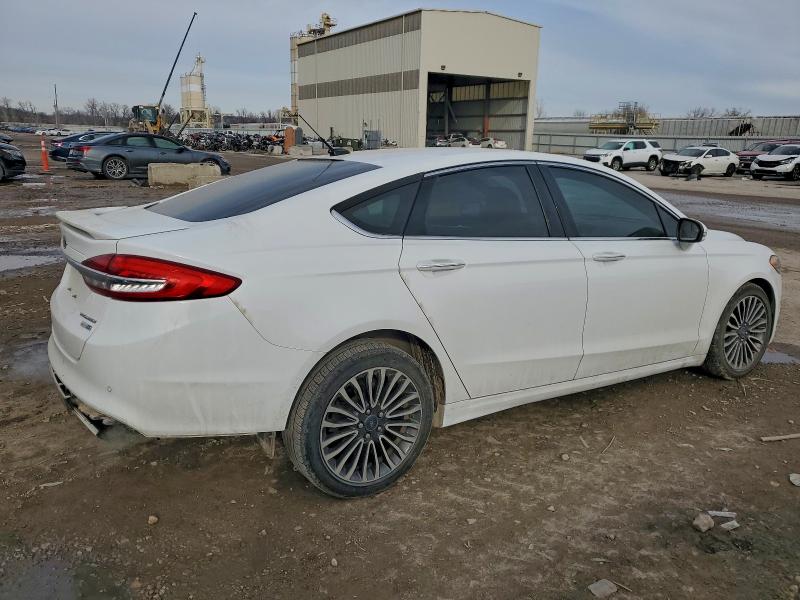 Photo 3 from auction – 2018 FORD FUSION TIT with VIN 3FA6P0D99JR131370