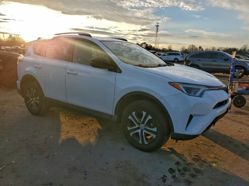 Photo 4 from auction – 2016 TOYOTA RAV4 LE with VIN JTMBFREV8GJ101808