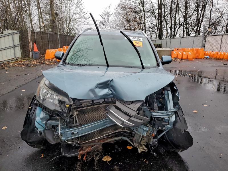 Photo 5 from auction – 2014 HONDA CR-V EXL with VIN 2HKRM4H7XEH670945