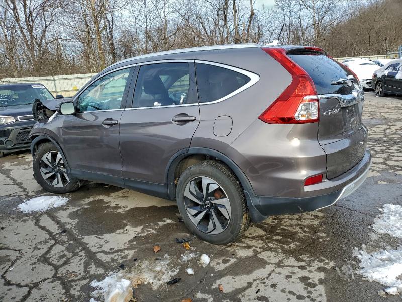 Photo 2 from auction – 2016 HONDA CR-V TOURI with VIN 5J6RM4H94GL098104