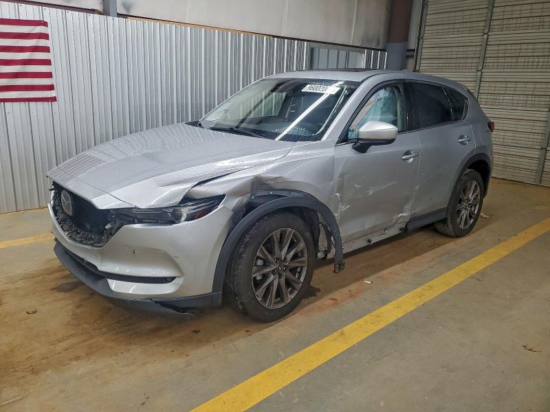 MAZDA CX-5 2021 with VIN JM3KFADM9M1351832 - Photo from auction