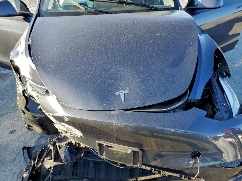 Photo 12 from auction – 2023 TESLA MODEL Y with VIN 7SAYGDEE9PA203894