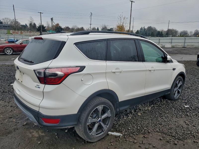 Photo 3 from auction – 2017 FORD ESCAPE SE with VIN 1FMCU9GD0HUB16281