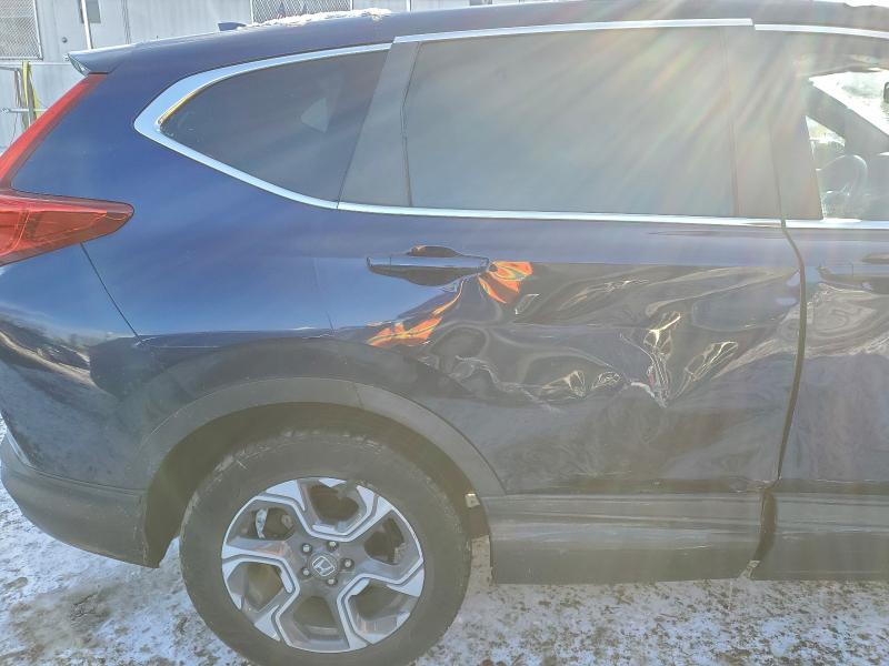 Photo 11 from auction – 2019 HONDA CR-V EXL with VIN 7FARW2H82KE028094