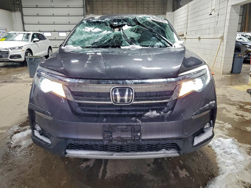 Photo 5 from auction – 2021 HONDA PILOT EX with VIN 5FNYF6H3XMB023201