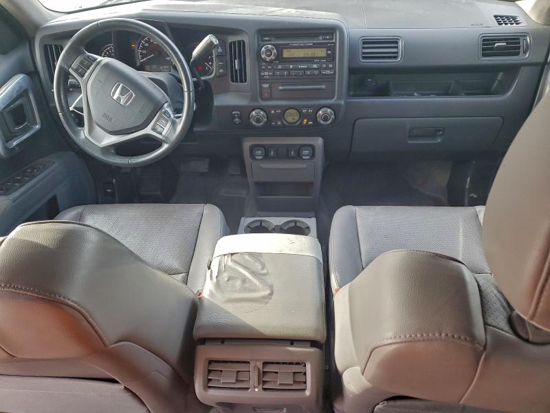 Photo 8 from auction – 2011 HONDA RIDGELINE with VIN 5FPYK1F50BB453939