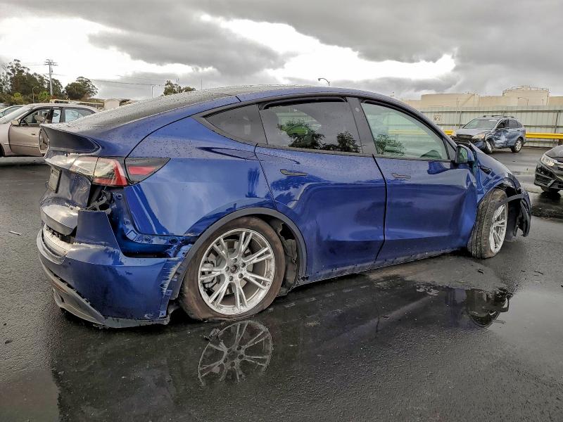 Photo 3 from auction – 2022 TESLA MODEL Y with VIN 7SAYGAEE1NF549792