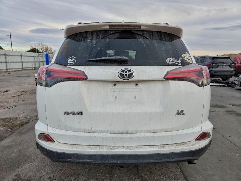 Photo 6 from auction – 2018 TOYOTA RAV4 LE with VIN JTMBFREV9JJ250073