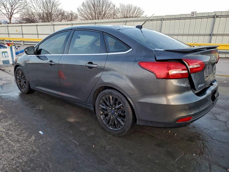 Photo 2 from auction – 2015 FORD FOCUS TITA with VIN 1FADP3J25FL328218