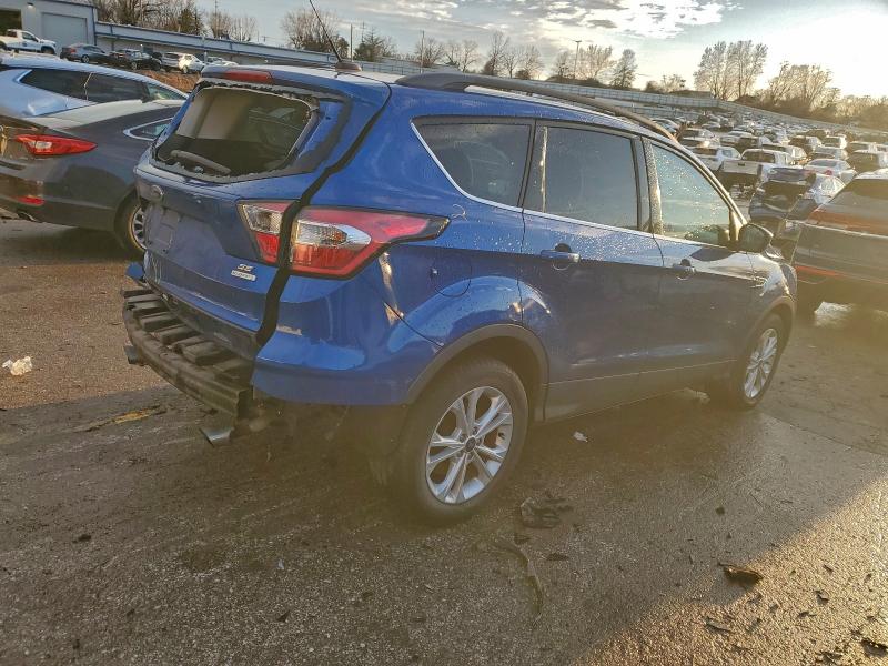 Photo 3 from auction – 2017 FORD ESCAPE SE with VIN 1FMCU0GD9HUC40223