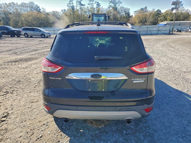 Photo 6 from auction – 2014 FORD ESCAPE with VIN 1FMCU0JX3EUD48559